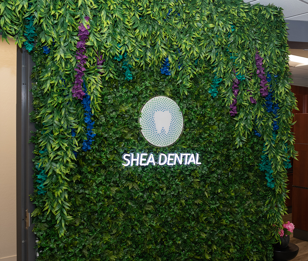 Shea Dental of Scottsdale logo in green bush