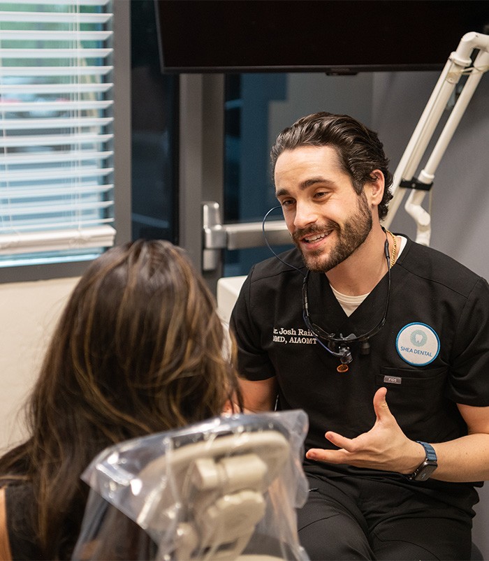 Scottsdale Arizona dentist Doctor Josh Raiffe talking to a dental patient