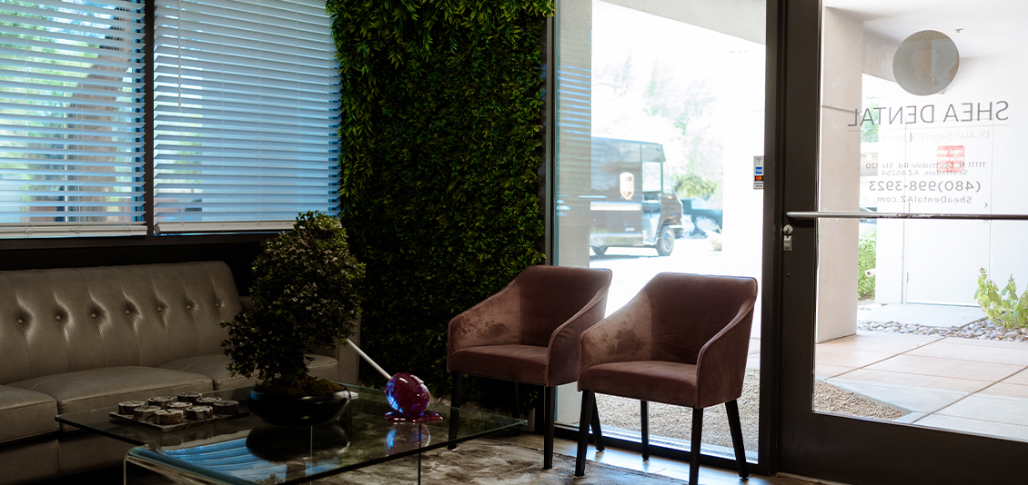 Leather couch in reception area of dental office