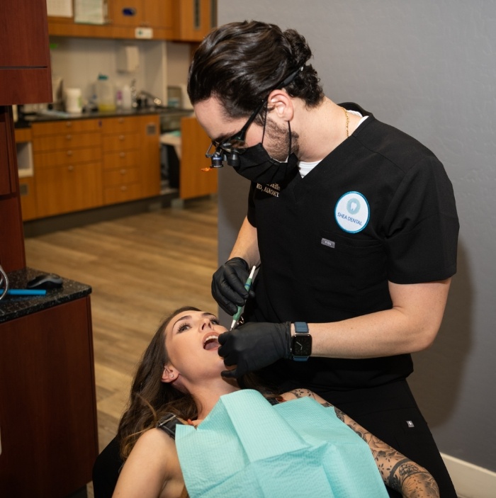 Dentist performing safe amalgam filling removal in Scottsdale