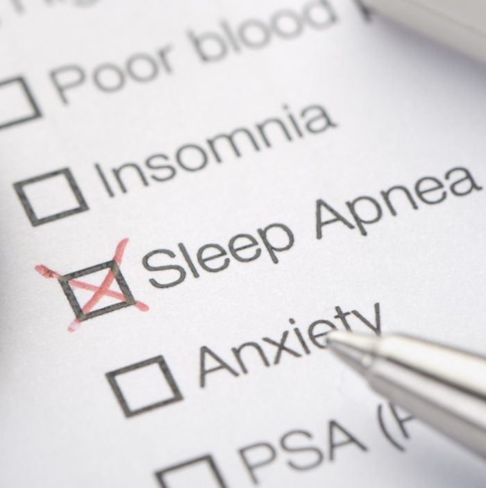 Paper with list of medical conditions with sleep apnea checked off
